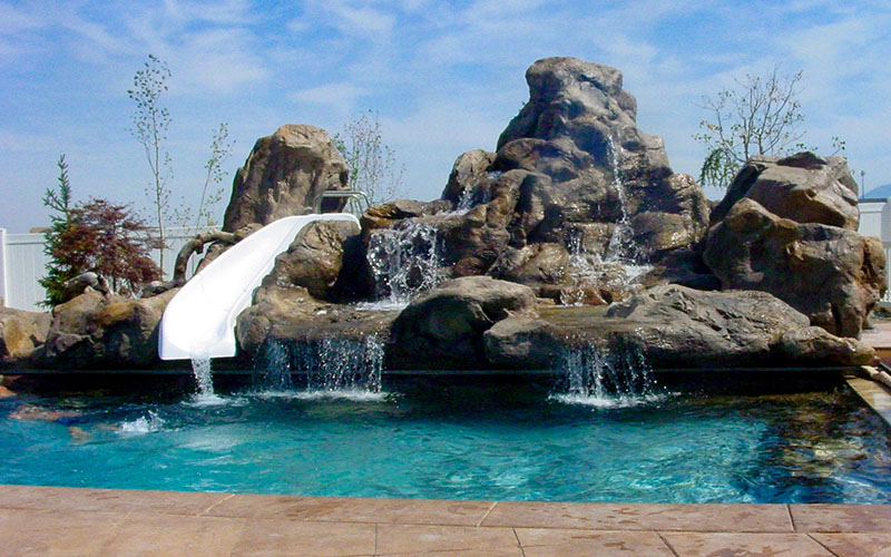 Utah Custom Rock Waterfalls & Pool Slides | Salt Lake City Resort-Style Pools and Backyard Lazy River Builder | Stevenson Brothers Custom Pools | SBI Waterfalls