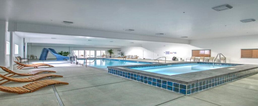 Indoor swimming pool hot tub in Salt Lake City, Utah house - Stevenson Brothers Custom Pools