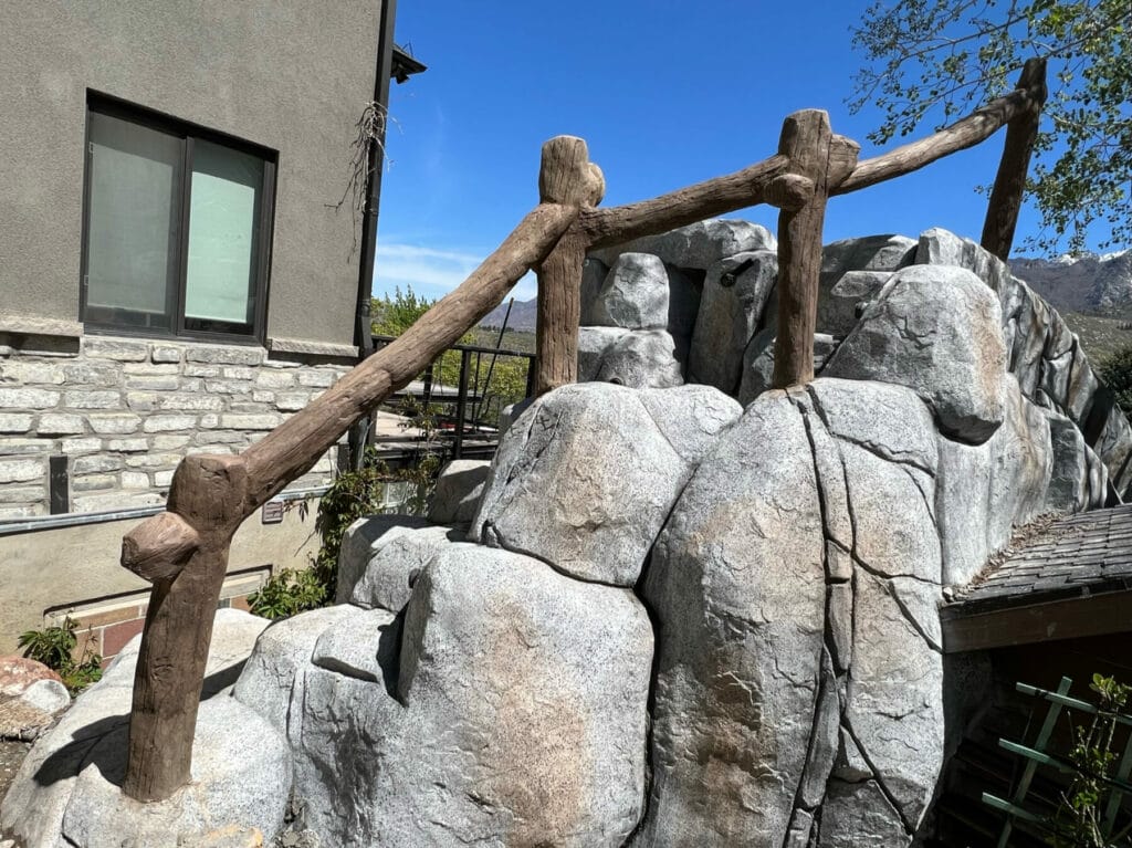Artificial Concrete Rock Work achieves natural rock and wood aesthetic on backyard patio in Salt Lake City, Utah