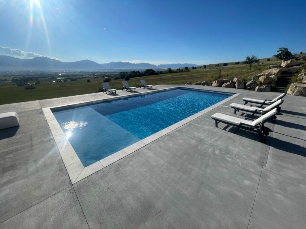 Utah custom swimming pool builder and landscaping patio contractor construction project