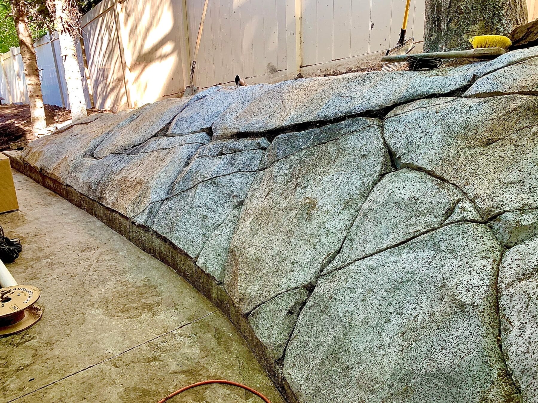 Artificial Concrete Rock Work achieves natural rock aesthetic in Salt Lake City patio construction project